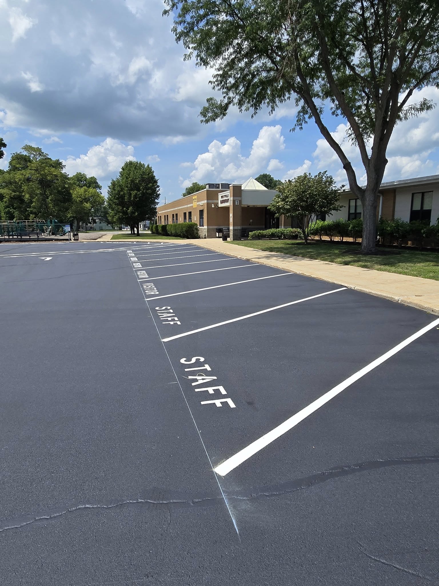 westville high school asphalt parking lot with striping