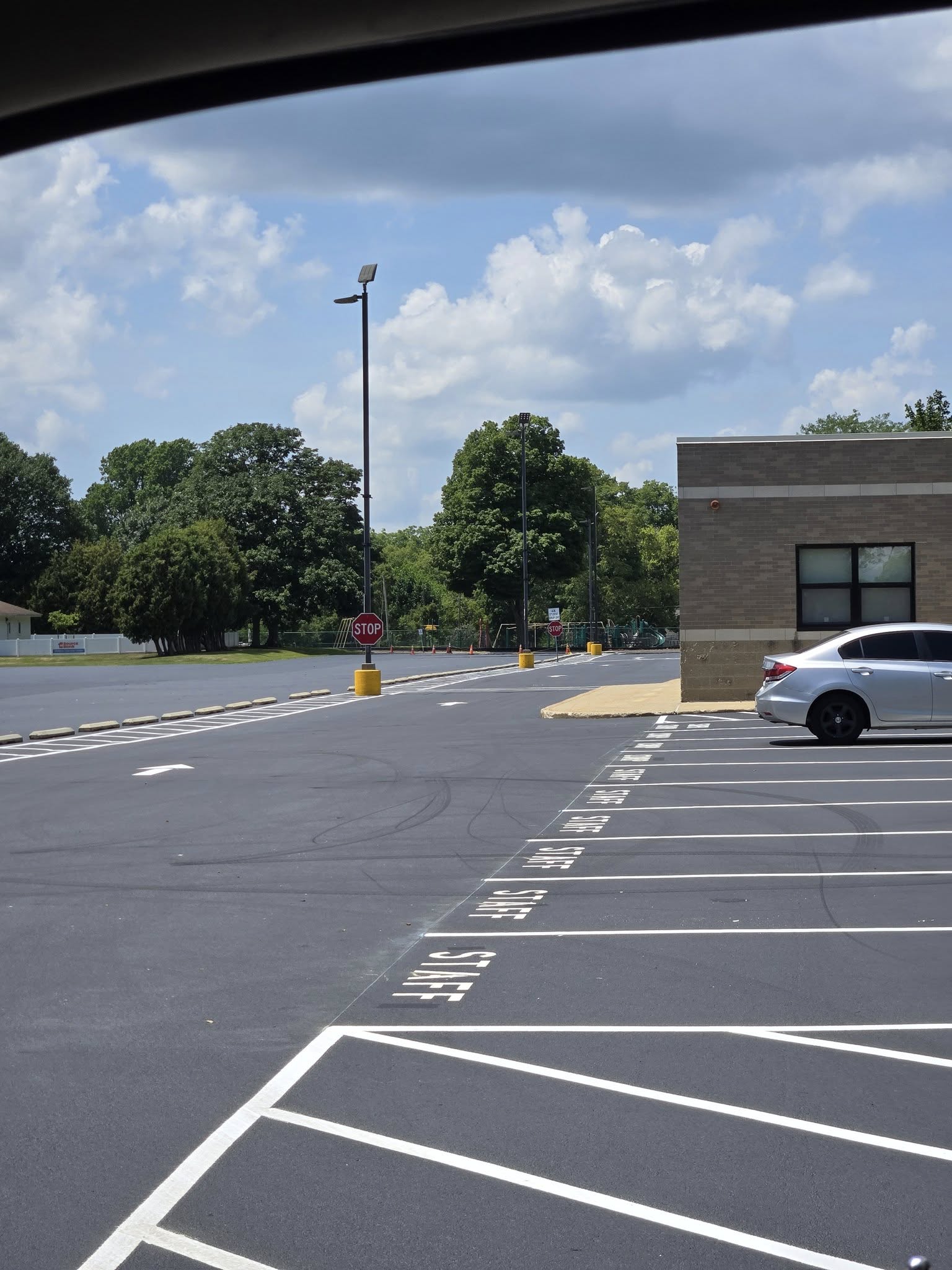westville high school asphalt parking lot with striping